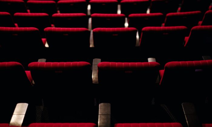 Rows Of Red Seats In A Theatre
