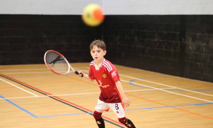 boy playing tennis Webster's Sports Centre
